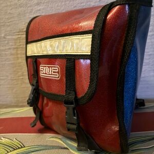 Y2K SNUG vintage backpack. Red and blue sparkly material.